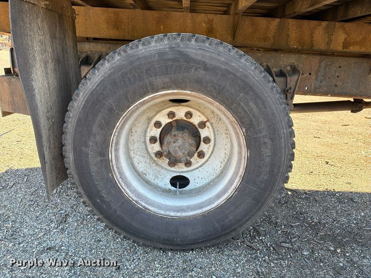 image for item FG3059 1999 International 4700 dump flatbed truck