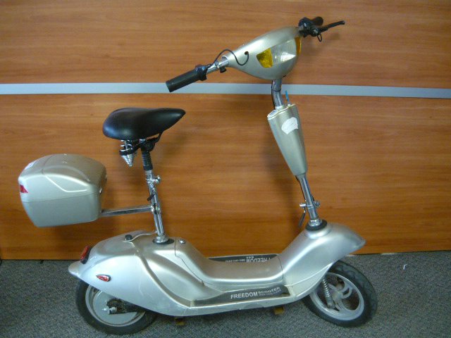 image for item 2688 Freedom 644 electric scooter